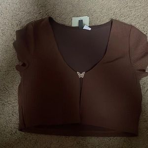 This is a brand New H&M top that I have never worn. It’s very pretty and stylish